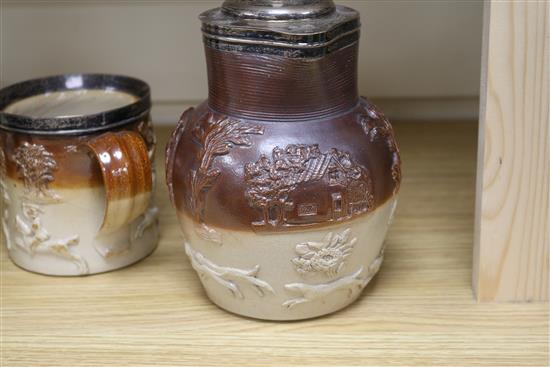 A Stoneware silver mounted jug and a matching mug, height 21cm